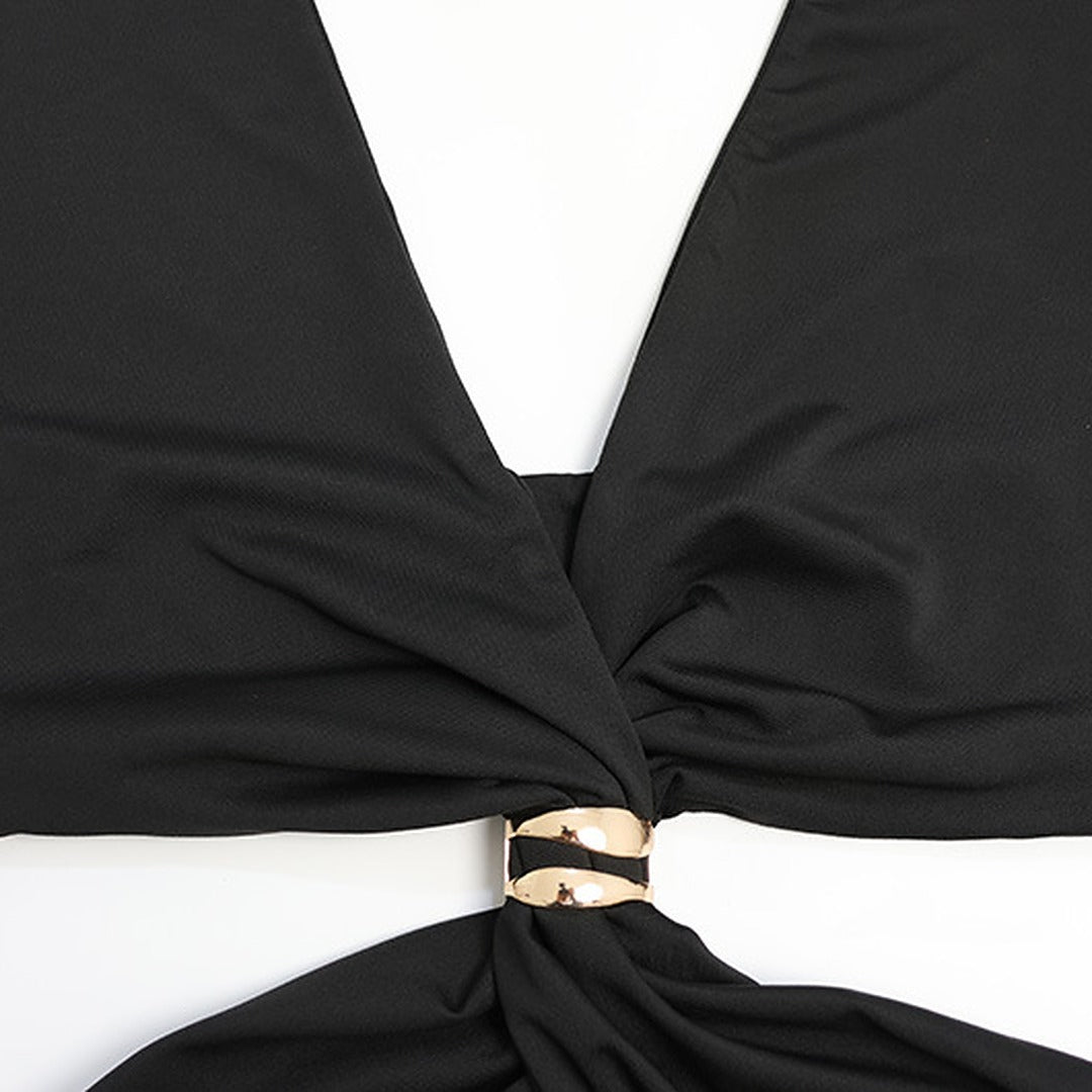 Black swimsuit with a gold buckle on a white background